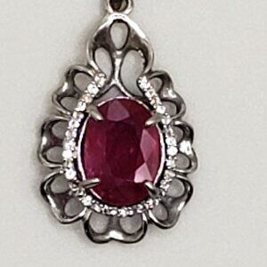 4.96 Carat Oval Faceted Ruby (Corendum) Pendant w/ 29 Colorless Topaz